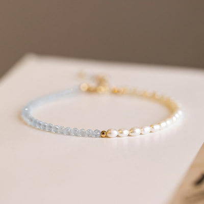 2 mm türkisfarbenes Perlenarmband mit Weisheit