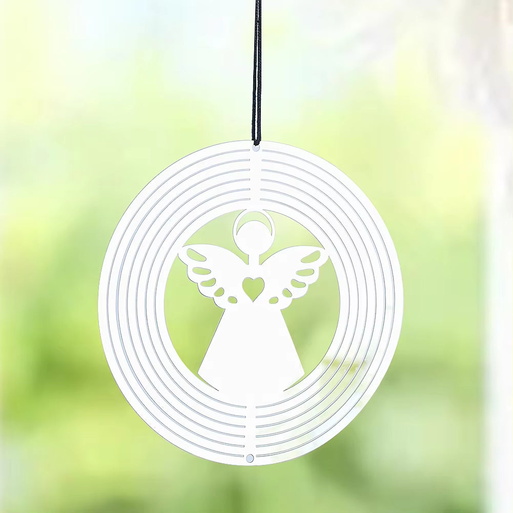 White metal wind spinner with angel design, wings, and heart for garden decor