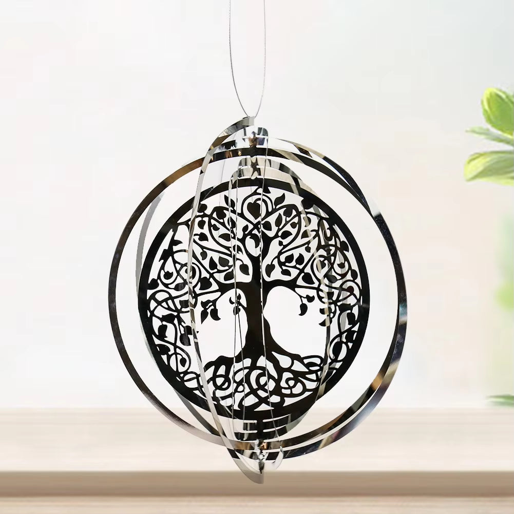 Circular metal wind spinner showcasing a Tree of Life with Celtic knotwork design