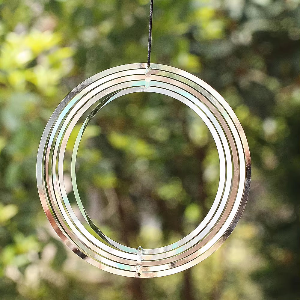 Metallic spiral wind spinner hanging as part of 3D Stainless Steel Kinetic Wind Spinner Suncatcher