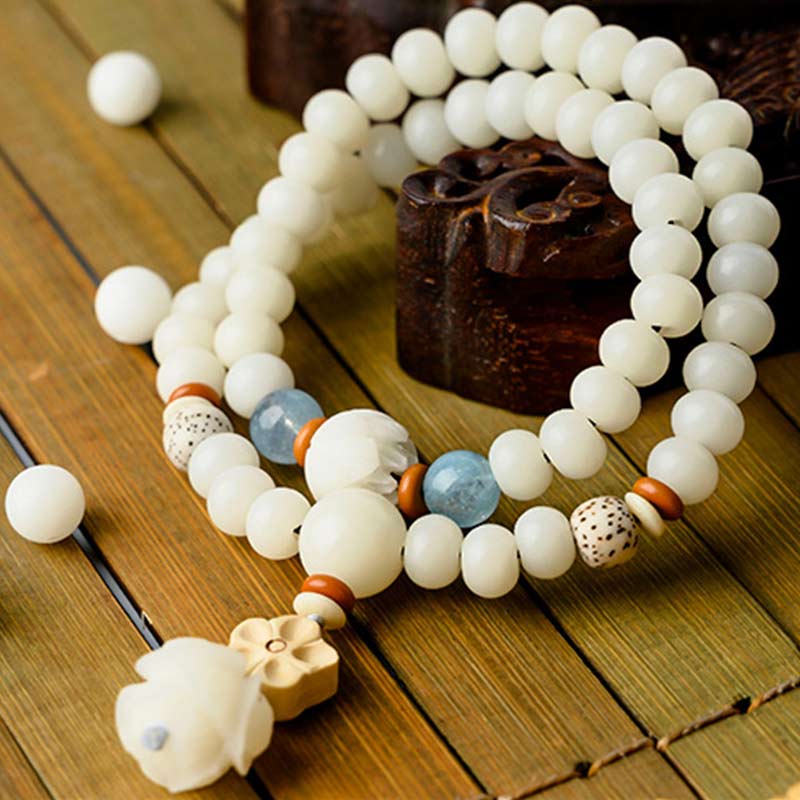 Unisex-Lotusarmband mit weißer Jade, Bodhi-Samen und Segen