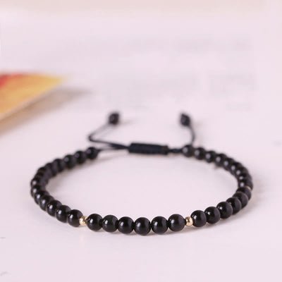 4 mm schwarzes Obsidian-Schutzseilarmband