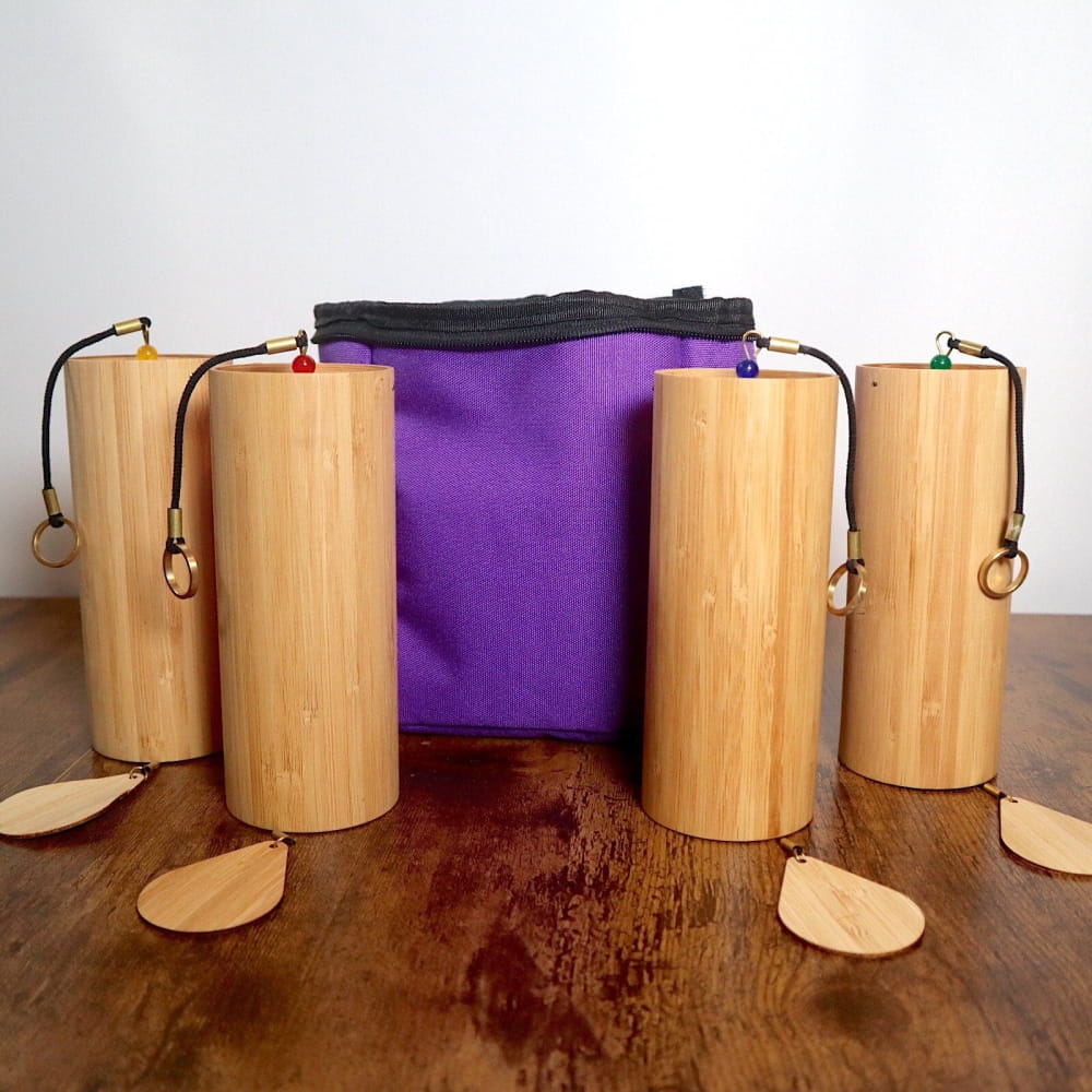 Wooden bamboo wind chimes with purple fabric center in 4pc Wind Chime Set