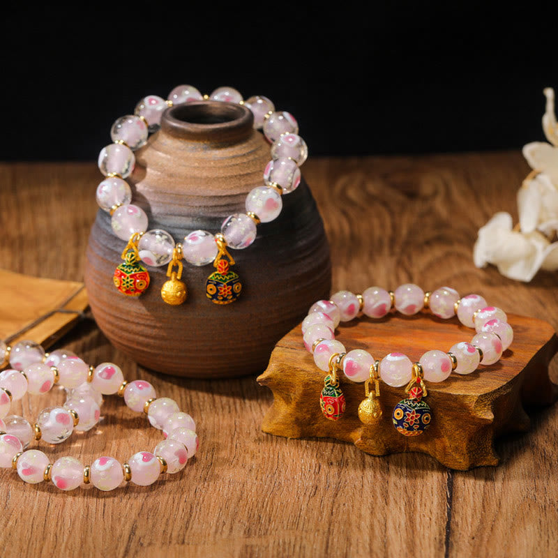 Luminous Pink Love Heart Spiritual Bracelet with Gold Swallowing Beast