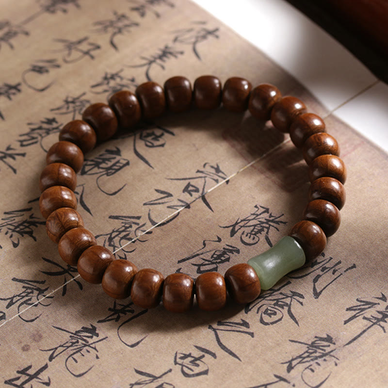 6*8mm Abelia Biflora Holz &amp; Hetian Jade Schutzarmband