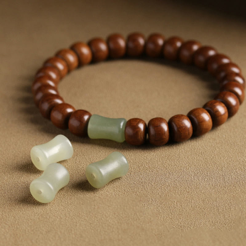 6*8mm Abelia Biflora Holz &amp; Hetian Jade Schutzarmband