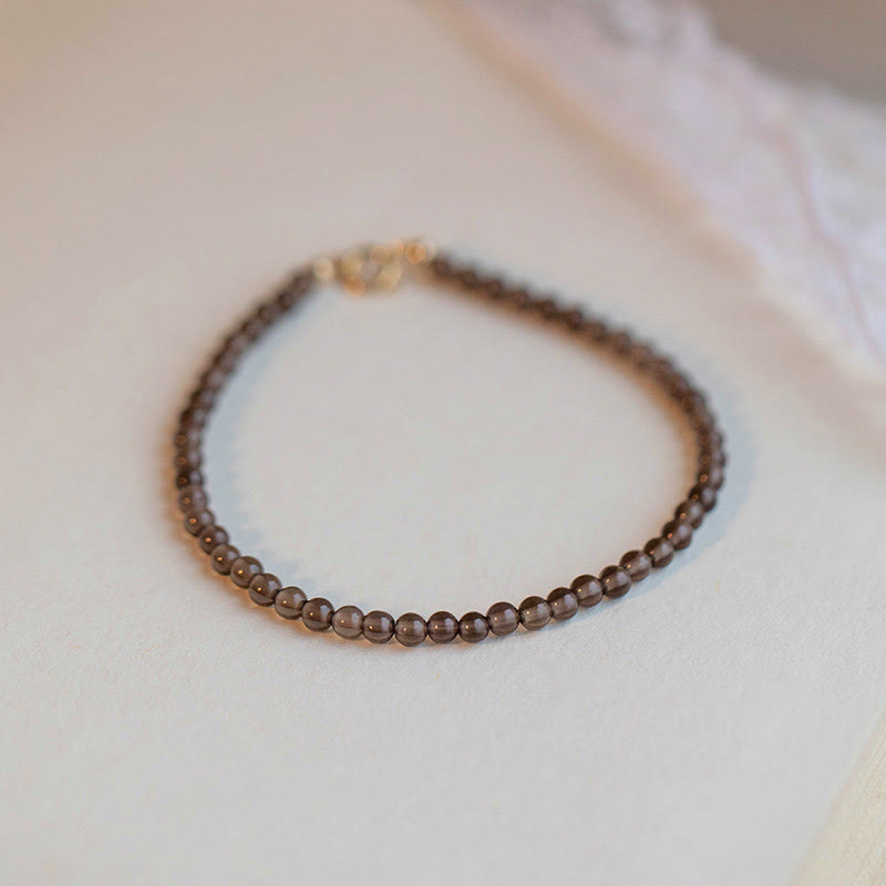 6 mm schwarzes Obsidian-Erfolgsarmband für Widerstandsfähigkeit und Konzentration