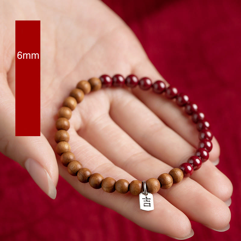 6 mm Zinnoberarmband mit Schutz aus Pfirsichholz und Sterlingsilber