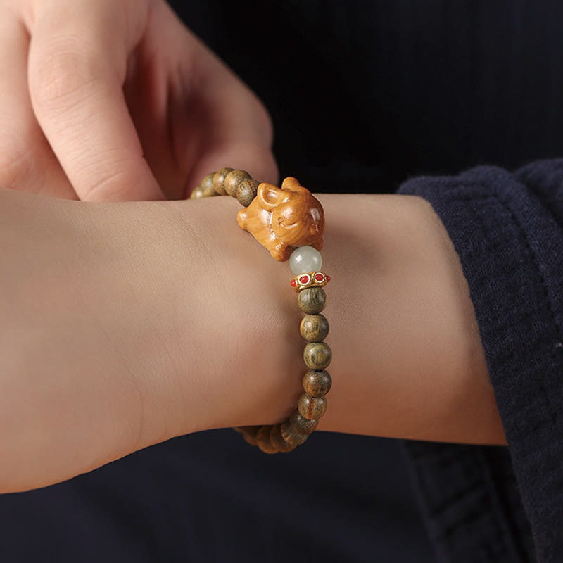 6 mm grünes Sandelholz-Armband mit positivem Kaninchen