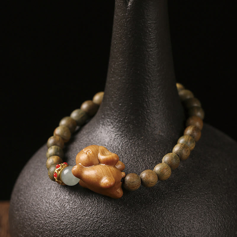 6 mm grünes Sandelholz-Armband mit positivem Kaninchen