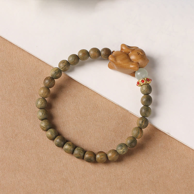 6 mm grünes Sandelholz-Armband mit positivem Kaninchen