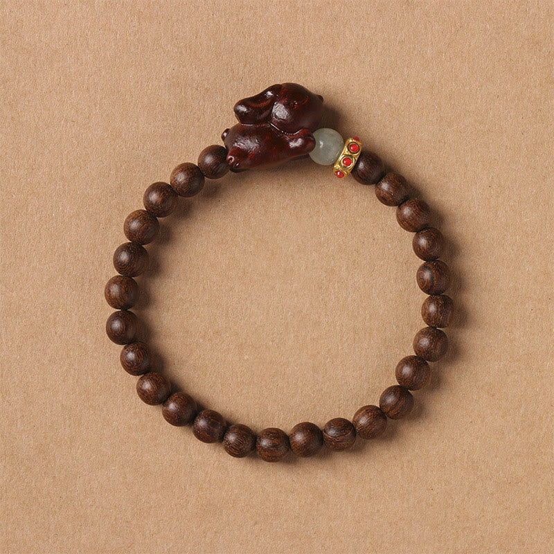 6 mm grünes Sandelholz-Armband mit positivem Kaninchen