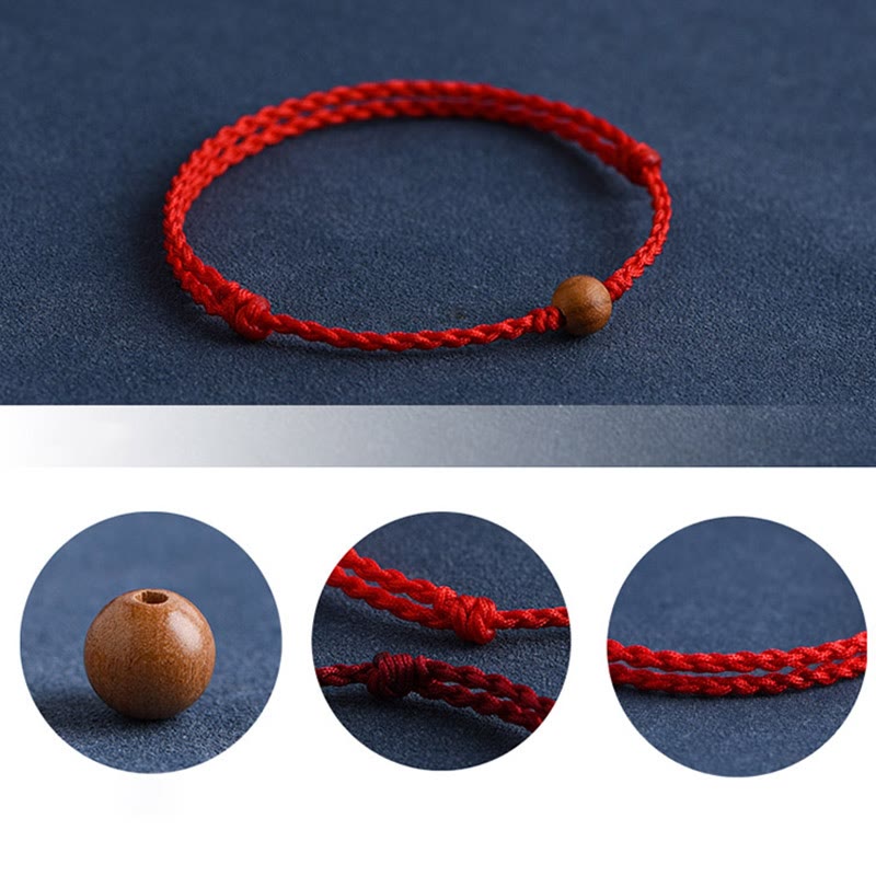 6 mm Schutzarmband aus Pfirsichholz mit roter Schnur