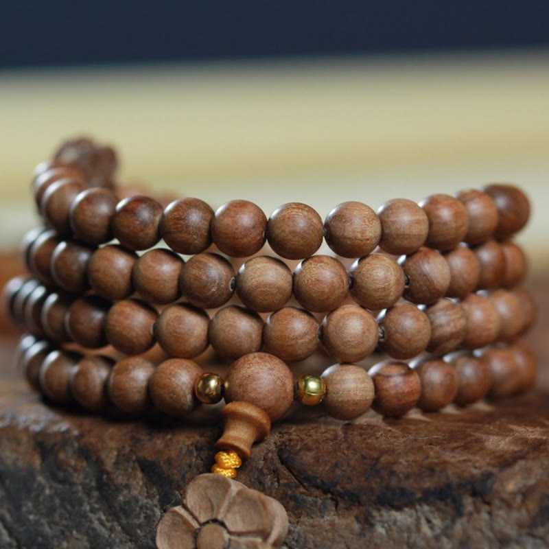 6 mm Sandelholz-Pflaumenblüten-Charm-Mala-Armband für Ruhe und Heilung