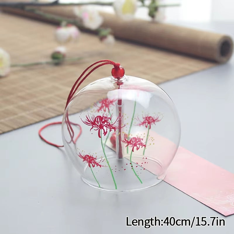 Clear glass wind chime featuring delicate red spider lily designs for outdoor decor