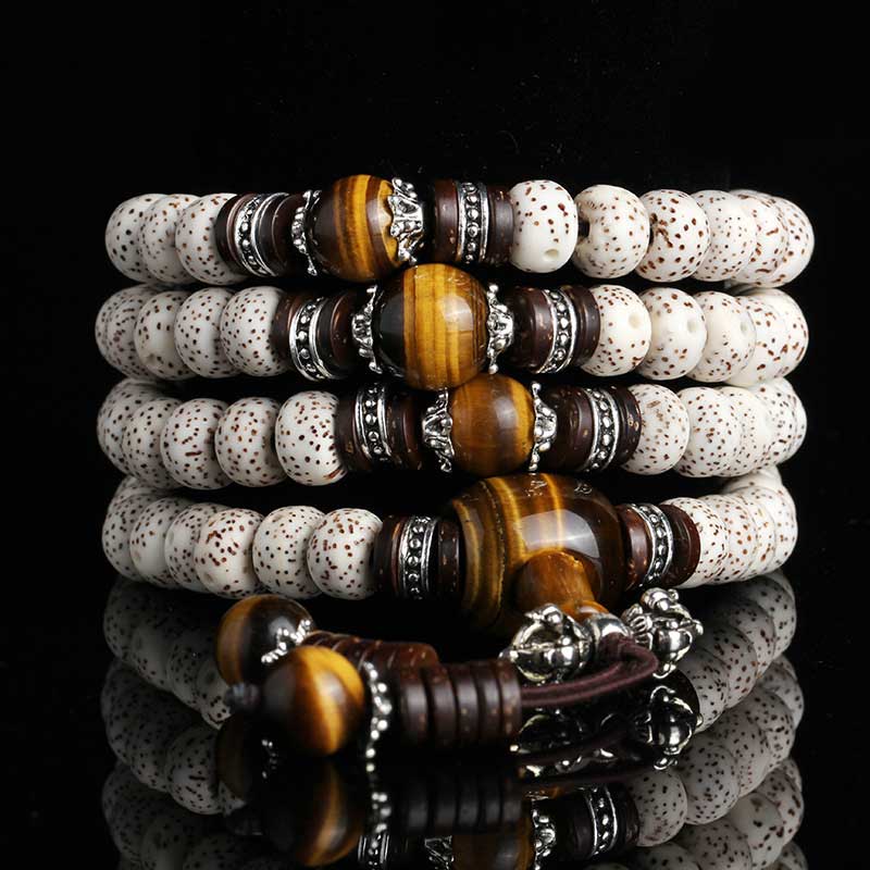 108 Perlen Tigerauge Bodhi Seed Armband 7x9mm Peace
