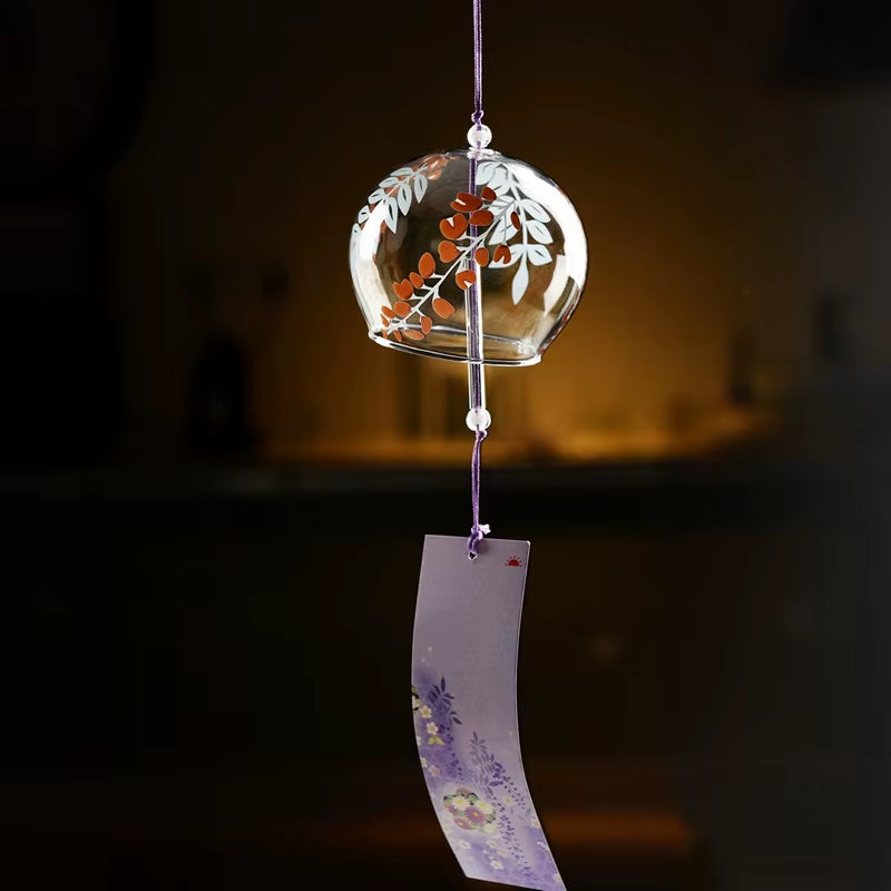 Japanese Glass Wind Chime featuring a delicate design and hanging paper tag for outdoor decor