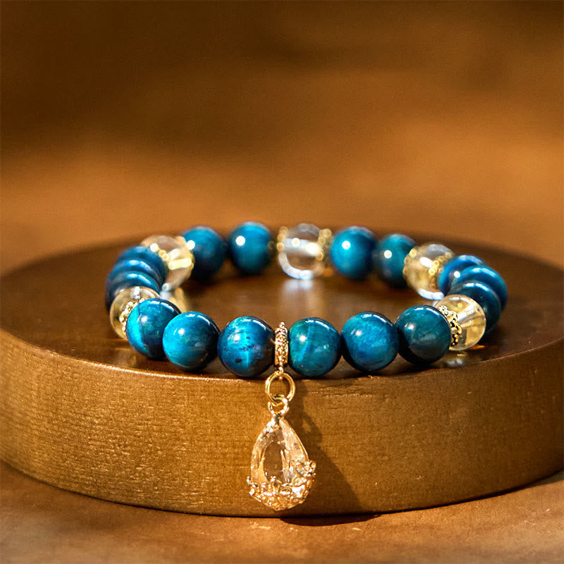8 mm Armband mit blauem Tigerauge und weißem Kristall
