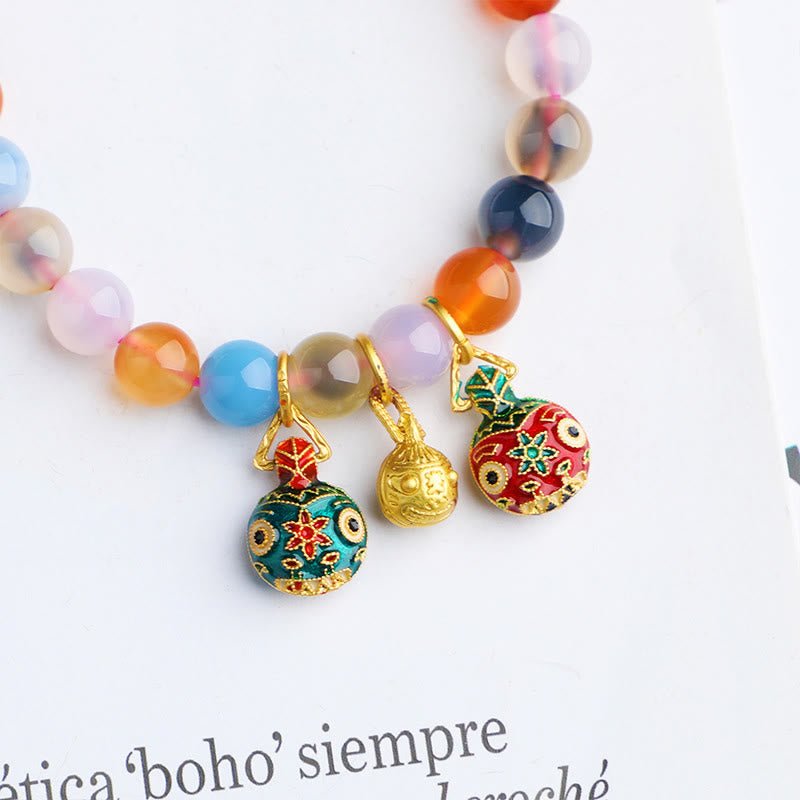 8 mm Candy-Achat-Achat-Armband mit goldenen Anhängern in Form eines schluckenden Tieres für Harmonie