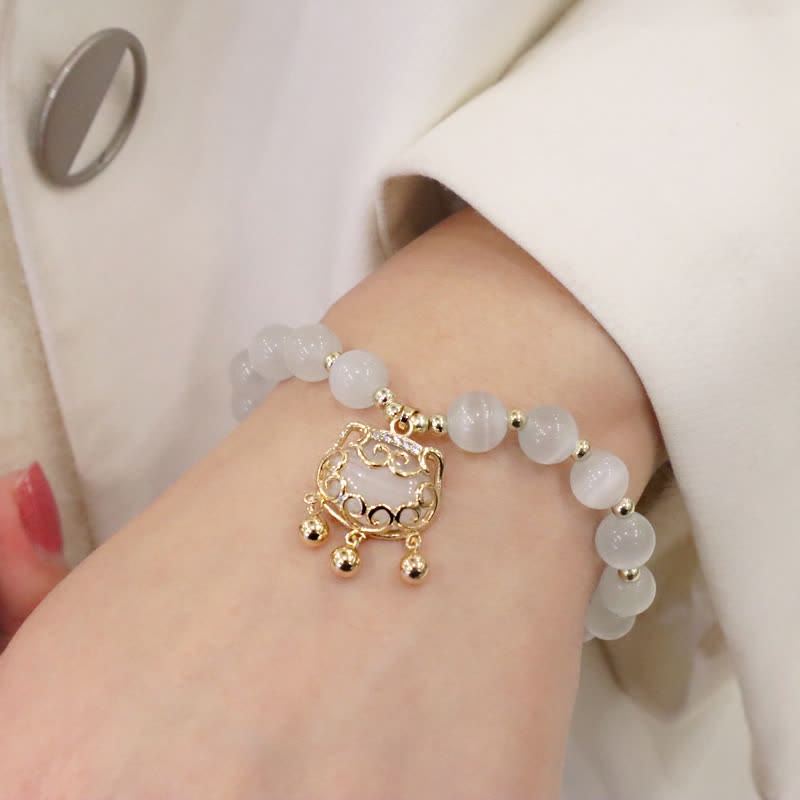 8 mm Katzenaugen-Perlen-Liebes-Charm-Armband für Ruhe und Frieden