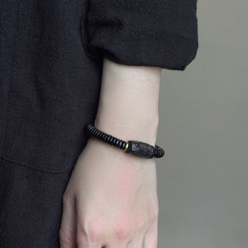 8 mm klassisches Ebenholz-Balance-Armband mit Löchern zur Erdung