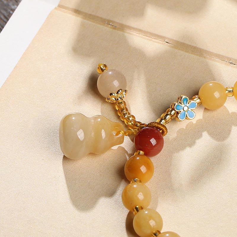 8 mm goldenes Jade-Armband aus Seide für Reichtum und Glück