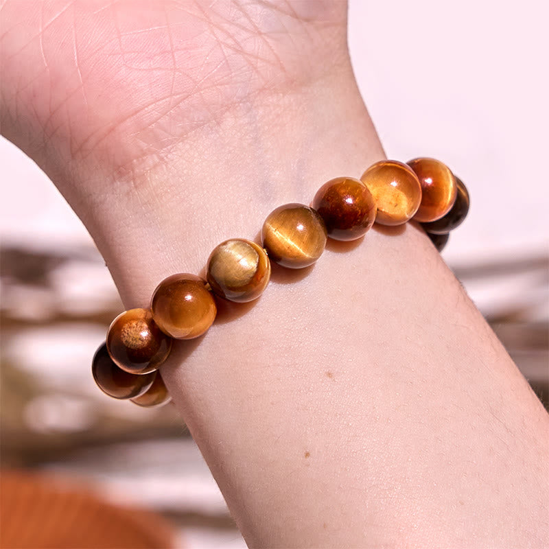 8 mm oranges Tigerauge-Kraftarmband für Konzentration und Schutz
