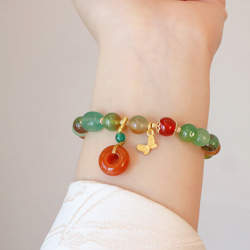 8 mm Armband mit Pfauenachat-Schmetterlings-Friedensschnalle