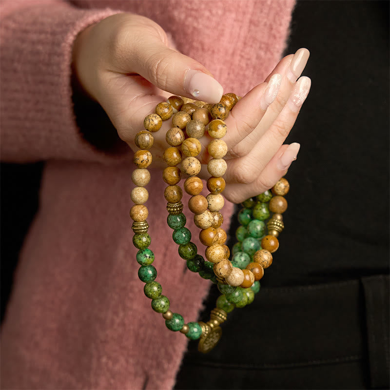 8 mm großes Lotusarmband aus Bildjaspis und Türkis für Positivität und Wachstum