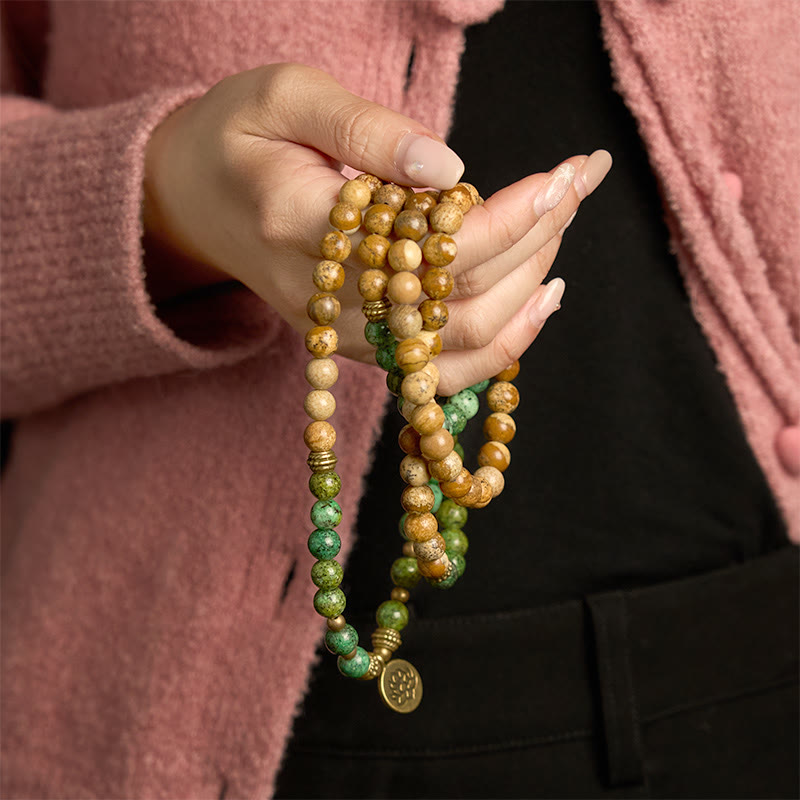 8 mm großes Lotusarmband aus Bildjaspis und Türkis für Positivität und Wachstum