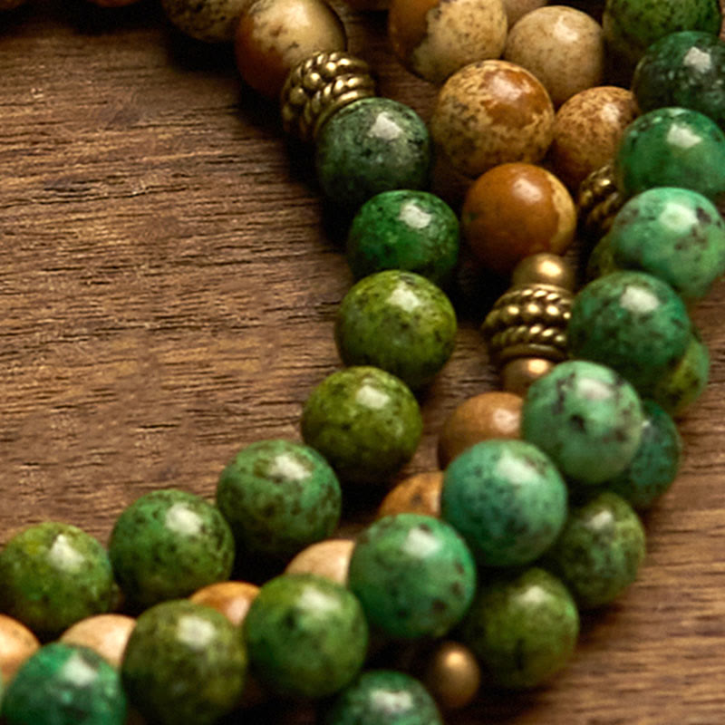 8 mm großes Lotusarmband aus Bildjaspis und Türkis für Positivität und Wachstum