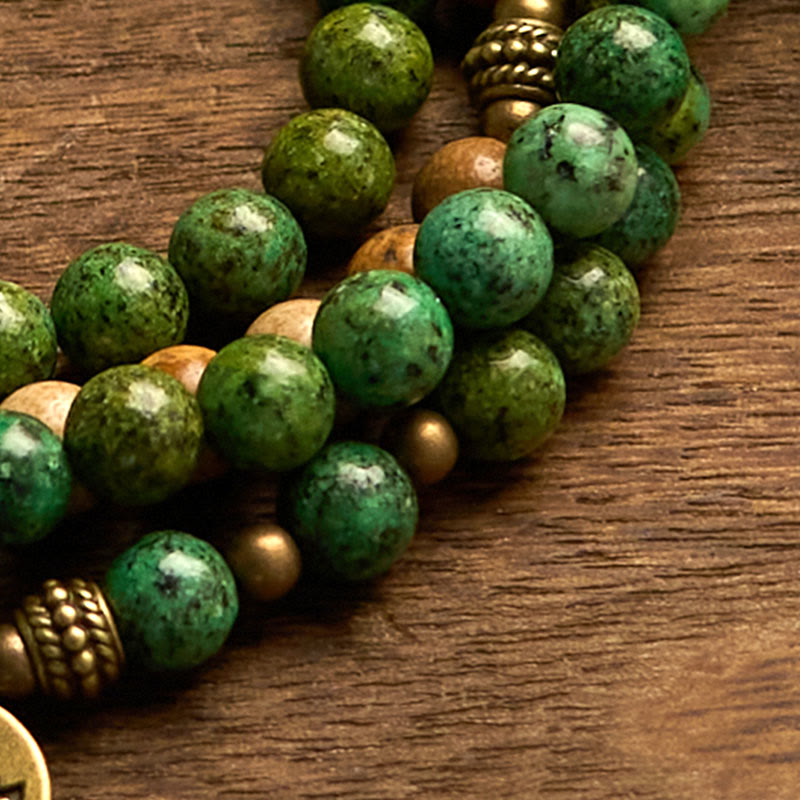 8 mm großes Lotusarmband aus Bildjaspis und Türkis für Positivität und Wachstum