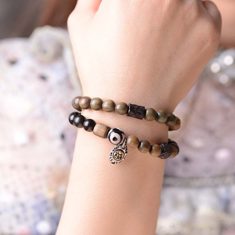 8 mm spirituelles Armband aus tibetischem Ebenholz und grünem Sandelholz