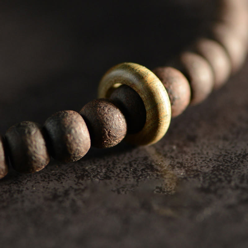 9-Augen-Dzi-Perle, Ebenholz, spirituelles Doppelwickelarmband