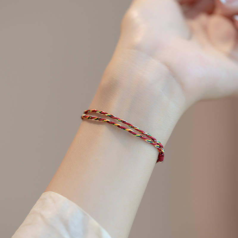 Glücksarmband aus 925er Sterlingsilber mit Koi-Fisch und roter Schnur