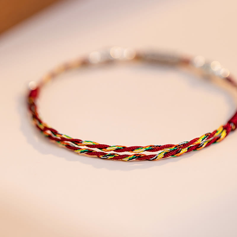 Glücksarmband aus 925er Sterlingsilber mit Koi-Fisch und roter Schnur