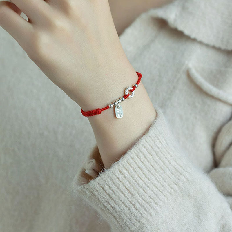 Spirituelles Armband mit Peace-Schnalle aus 925er Sterlingsilber und roter Schnur