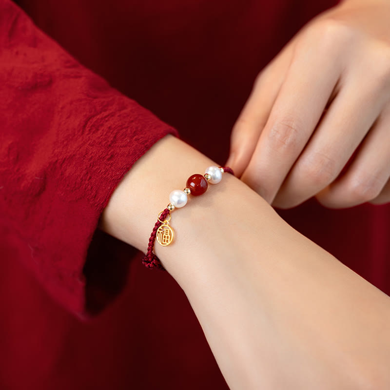 Rotes Schnurarmband aus 925er Sterlingsilber mit Fu-Charakter