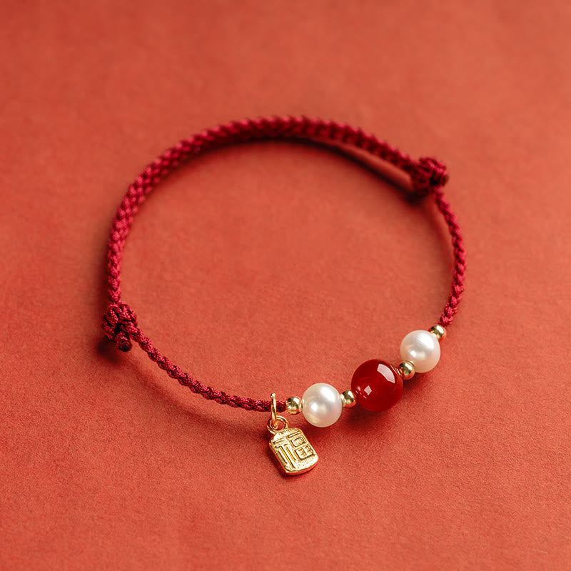 Rotes Schnurarmband aus 925er Sterlingsilber mit Fu-Charakter