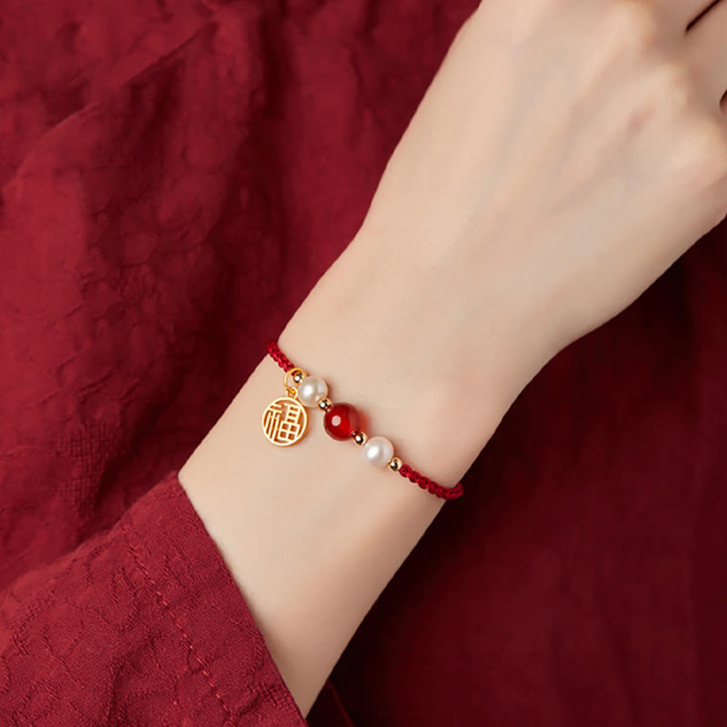 Rotes Schnurarmband aus 925er Sterlingsilber mit Fu-Charakter