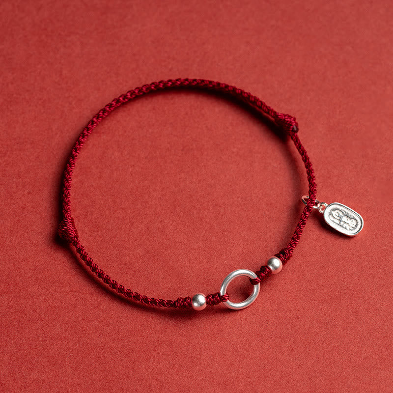 Rotes Schnurarmband aus 925er Sterlingsilber mit Peace Joy Lotus-Schnalle