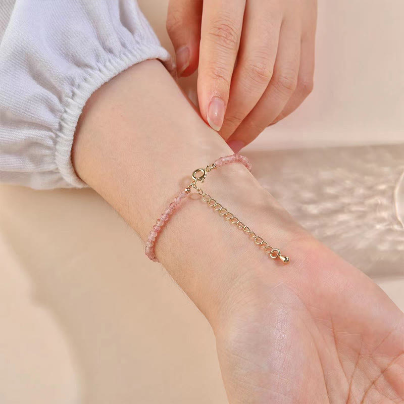 Bergkristallarmband mit Erdbeerquarz und Heilkristallen