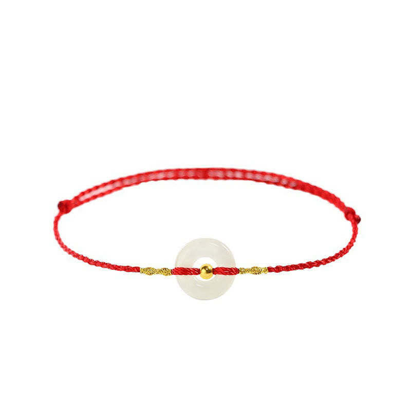 Glücksarmband aus 999er Goldperlen aus Hetian-Jade mit Friedensschnalle