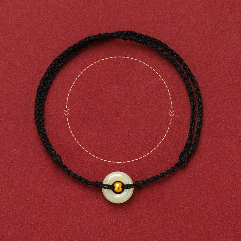 Glücksarmband aus 999er Goldperlen aus Hetian-Jade mit Friedensschnalle