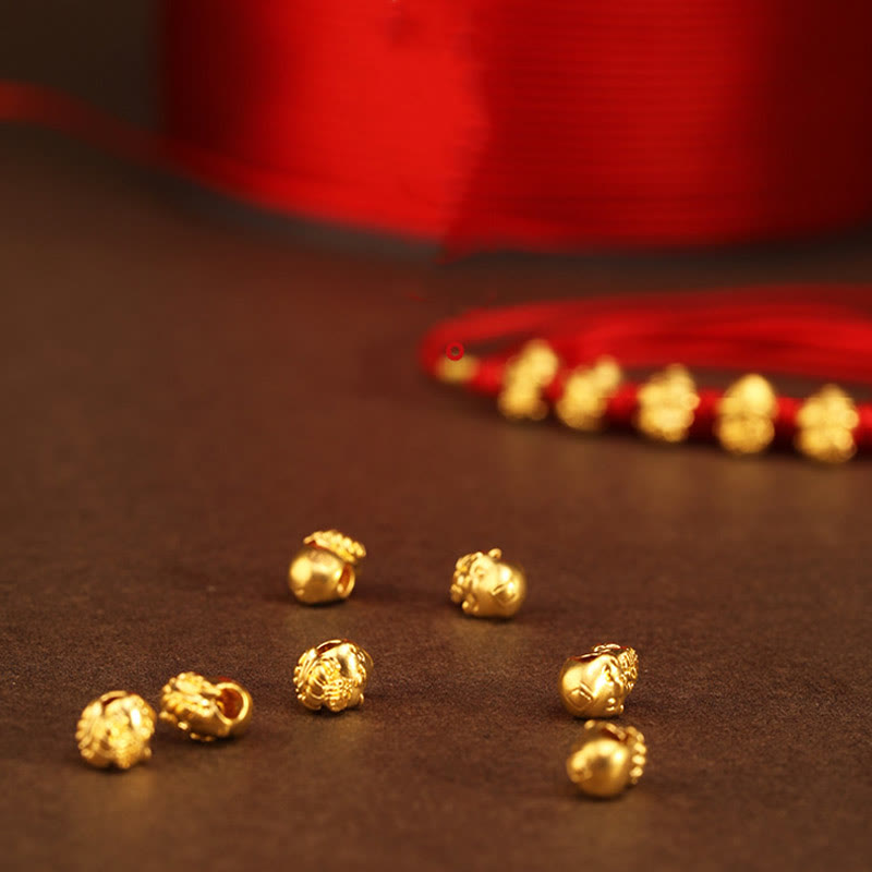 Bauchkette aus 999er Gold mit roter Schlangenschnur für Schutz und Wohlstand