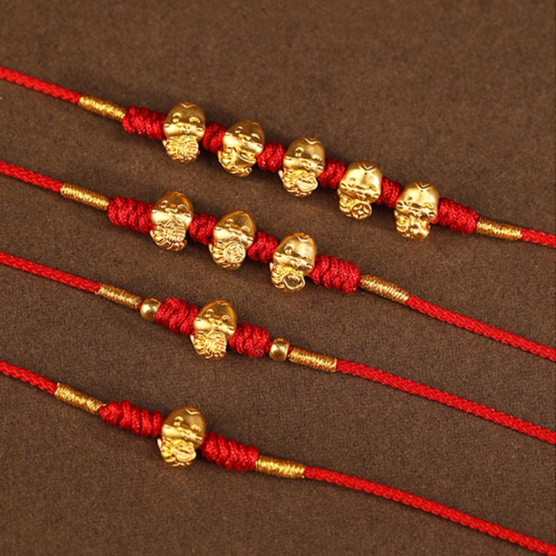 Bauchkette aus 999er Gold mit roter Schlangenschnur für Schutz und Wohlstand