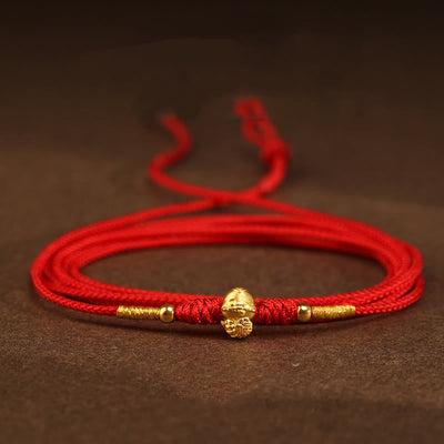 Bauchkette aus 999er Gold mit roter Schlangenschnur für Schutz und Wohlstand