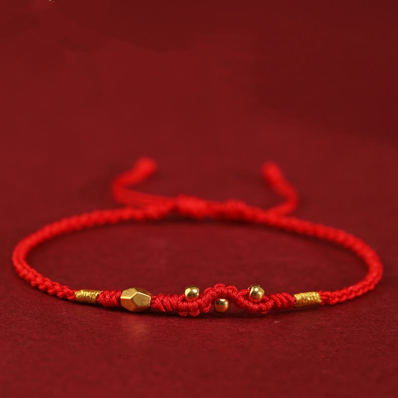 999 Gold Schlangen-Schutzarmband mit roter Schnur