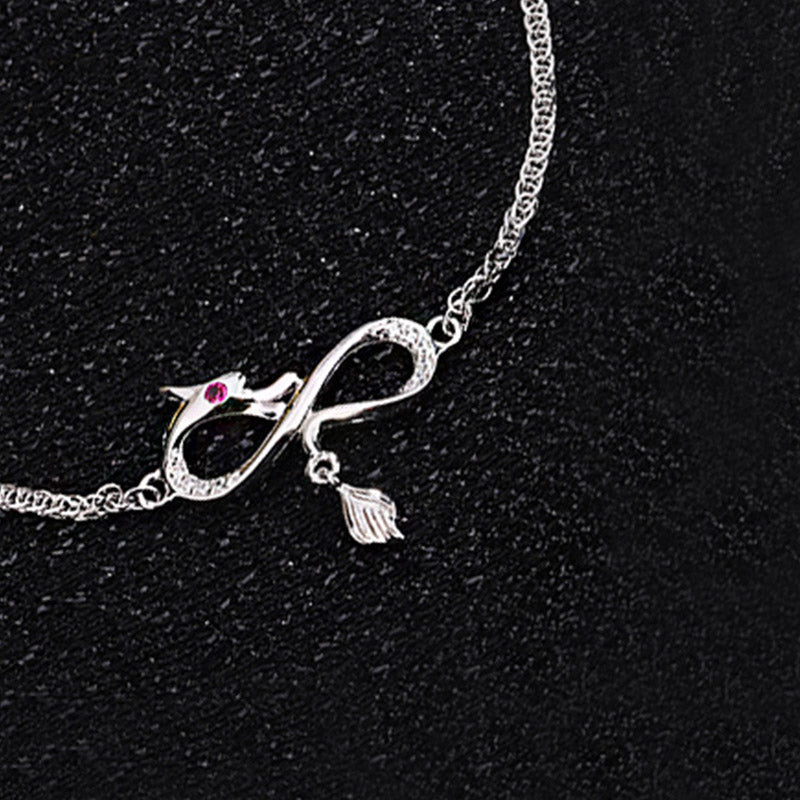 Drachenarmband aus 999er Sterlingsilber mit Zirkon-Endlosknoten-Anhänger