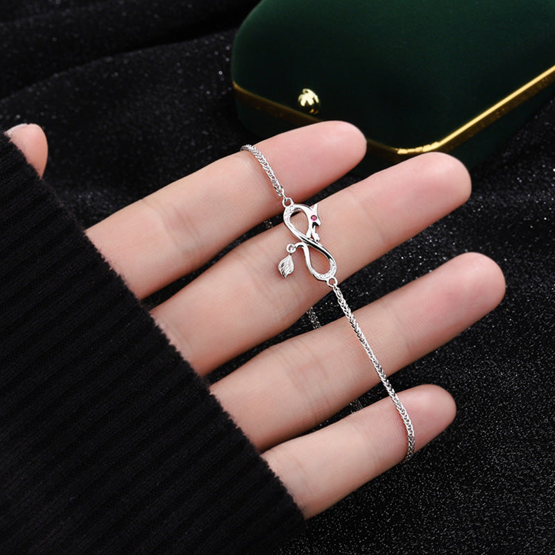 Drachenarmband aus 999er Sterlingsilber mit Zirkon-Endlosknoten-Anhänger